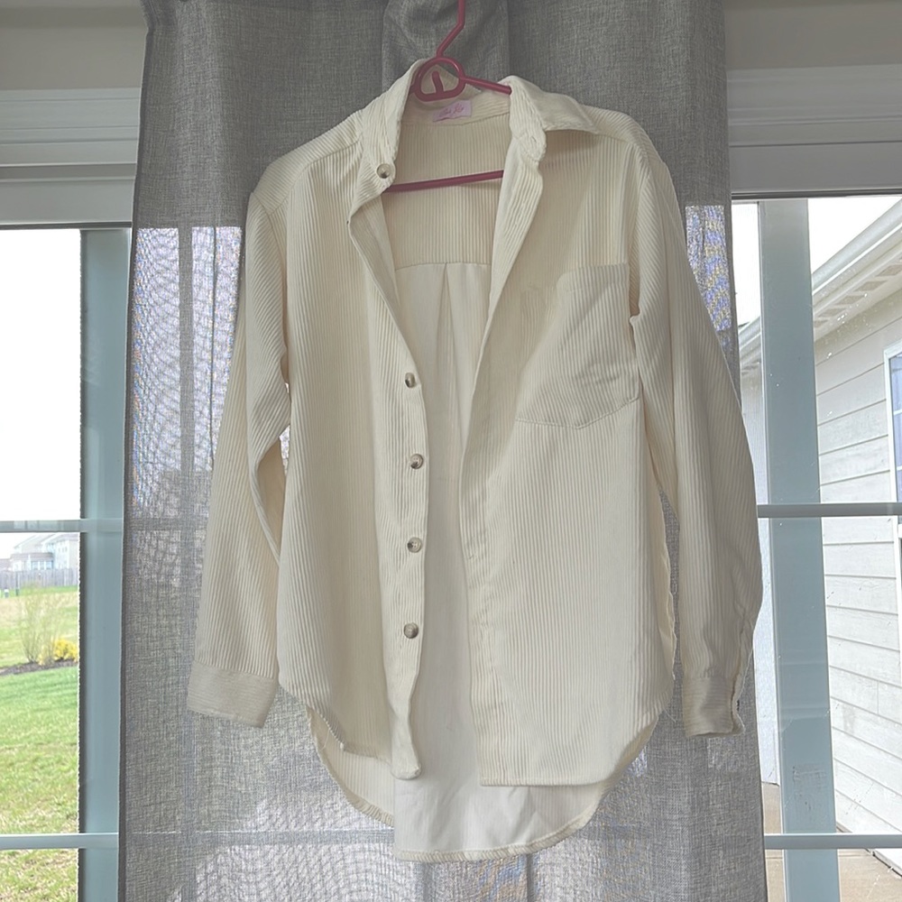 Soft, corduroy, lightweight shacket in cream.